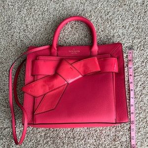Kate Spade pink bow valley satchel. Never been used. New with tags and dust bag.